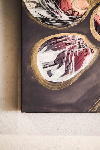 Art in the design hotel in South Tyrol Close-up of two abstract paintings on a white wall