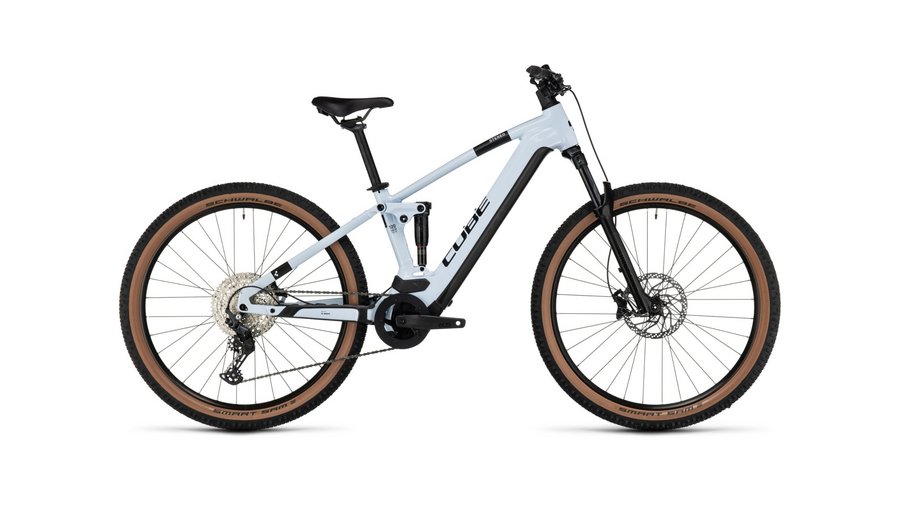 Bike rental Cube electric mountain bike with wide tires and suspension fork